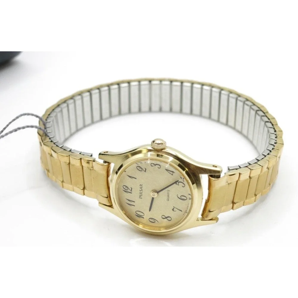New with Box Pulsar Gold Tone Quartz Watch Base Metal Bezel Stainless Steel Back